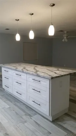 a view of a sink and a mirror