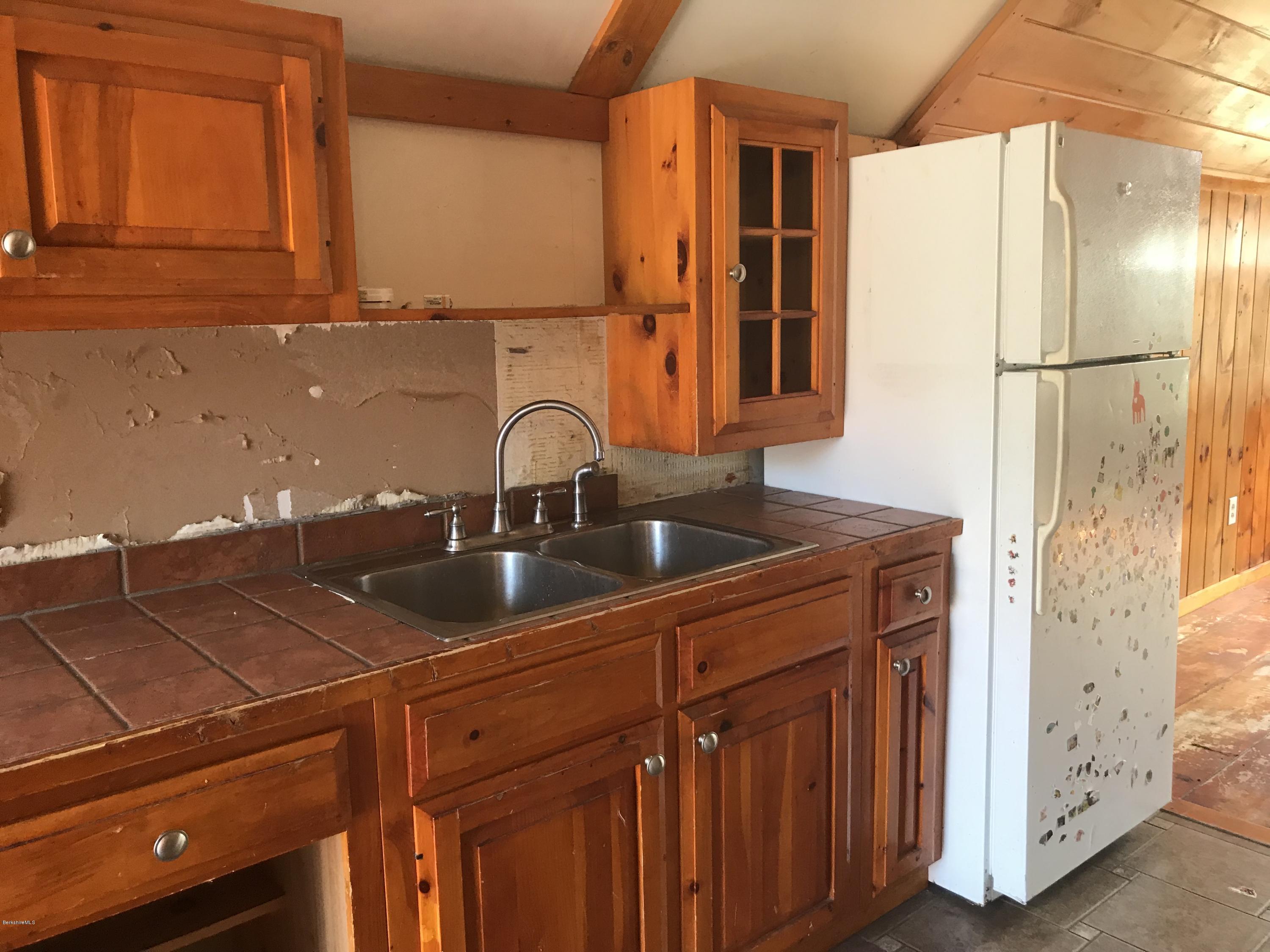 89 Hickingbotham Road Peru, MA 01235 - Photo 3 of 14 a bathroom with a sink and a mirror