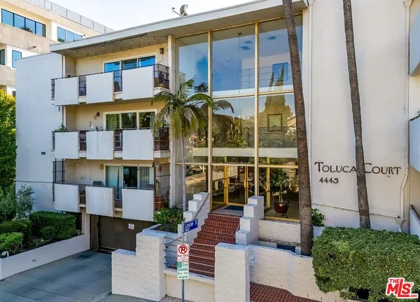 a view of building with a outdoor space
