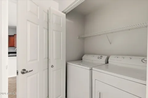 a utility room with dryer and washer