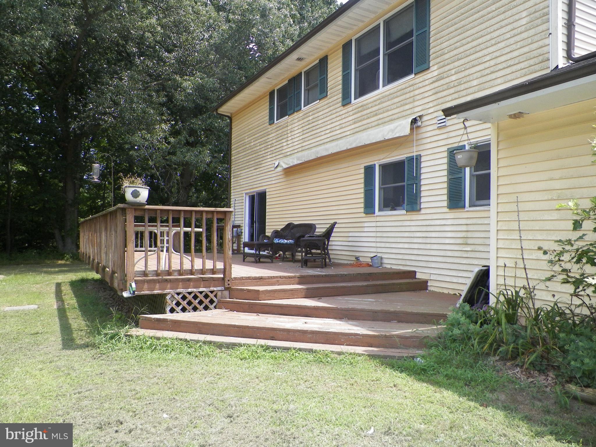 3151 Carroll Road Huntingtown, MD 20639 - Photo 17 of 30 a view of a house with backyard and sitting area