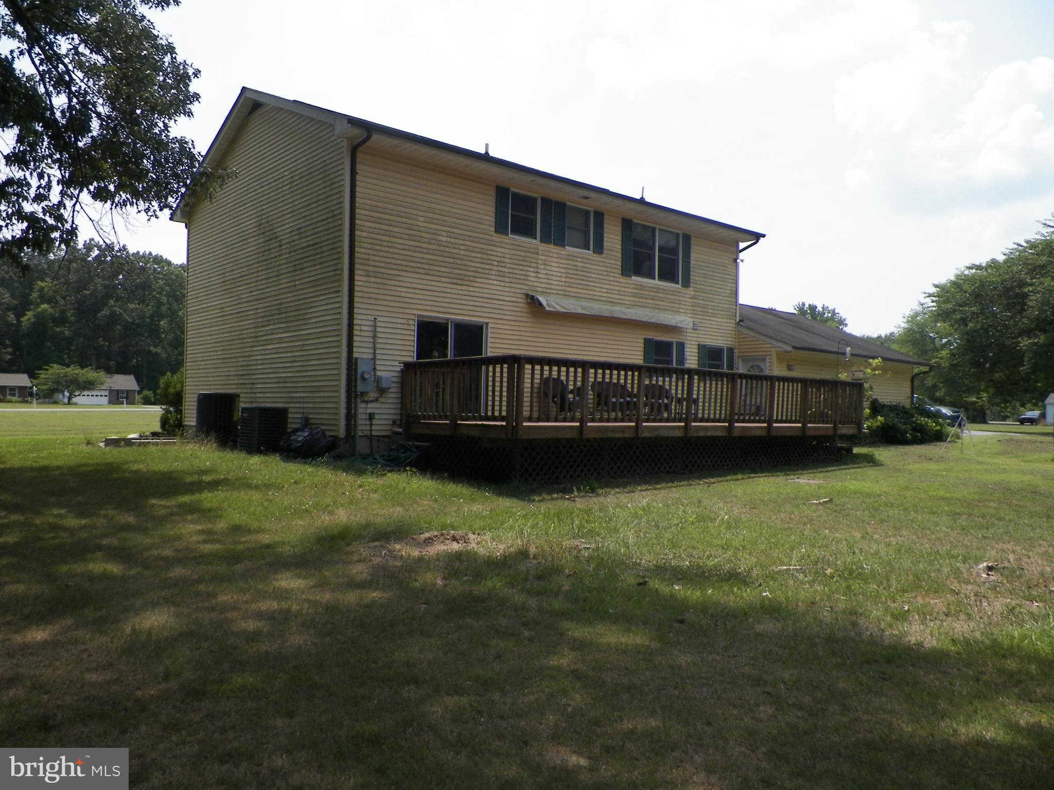 3151 Carroll Road Huntingtown, MD 20639 - Photo 30 of 30 a front view of a house with a garden