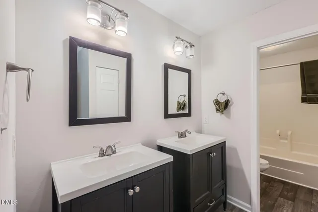a view of an entryway with wooden floor
