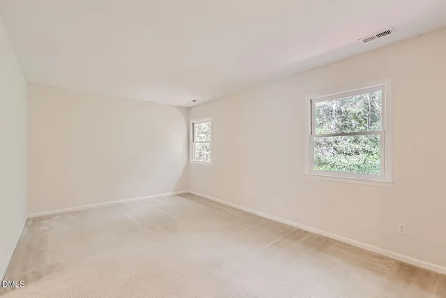 a kitchen with a sink stainless steel appliances and cabinets