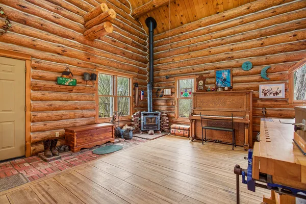 a room with wooden furniture and furniture