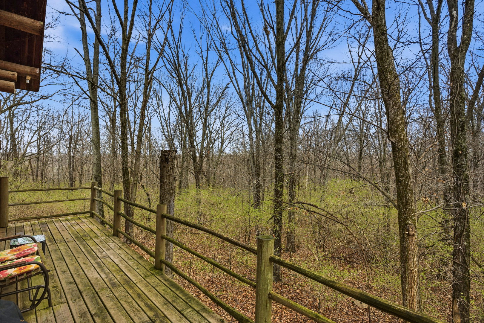 1418 East 2370 North Road White Heath, IL 61884 - Photo 28 of 49 a view of a balcony with wooden floor and fence