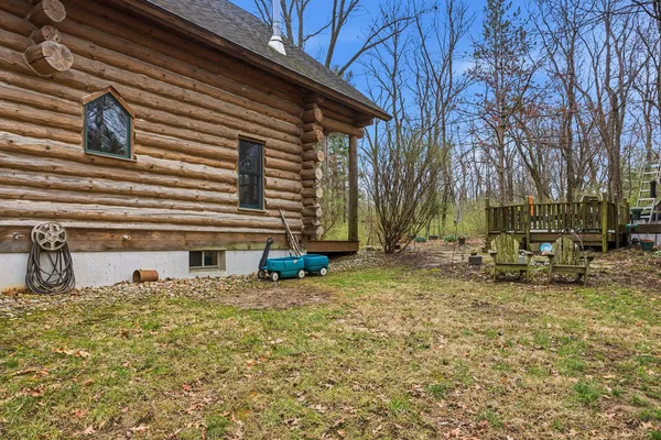 a view of a yard with tree s