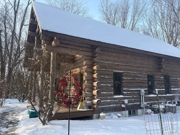 a view of a lake with a yard