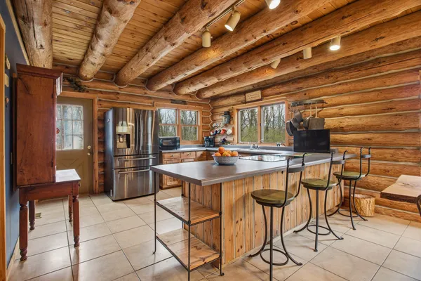 a room with chairs and tables