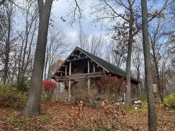 a house with trees in front of it