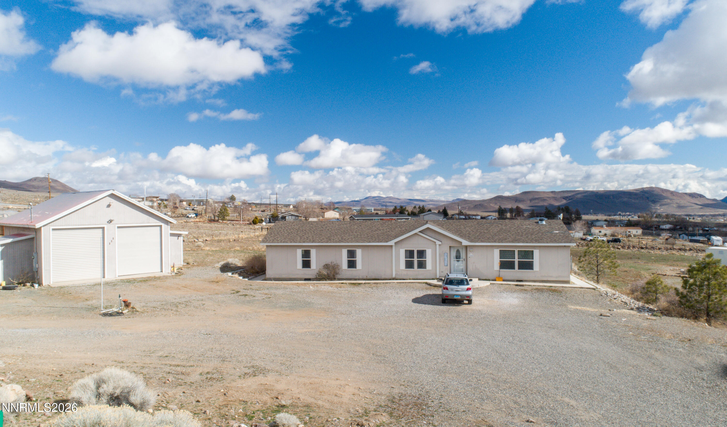 222 Julie Way Dayton, NV 89403 - Photo 1 of 28 a view of house with outdoor space and sitting area