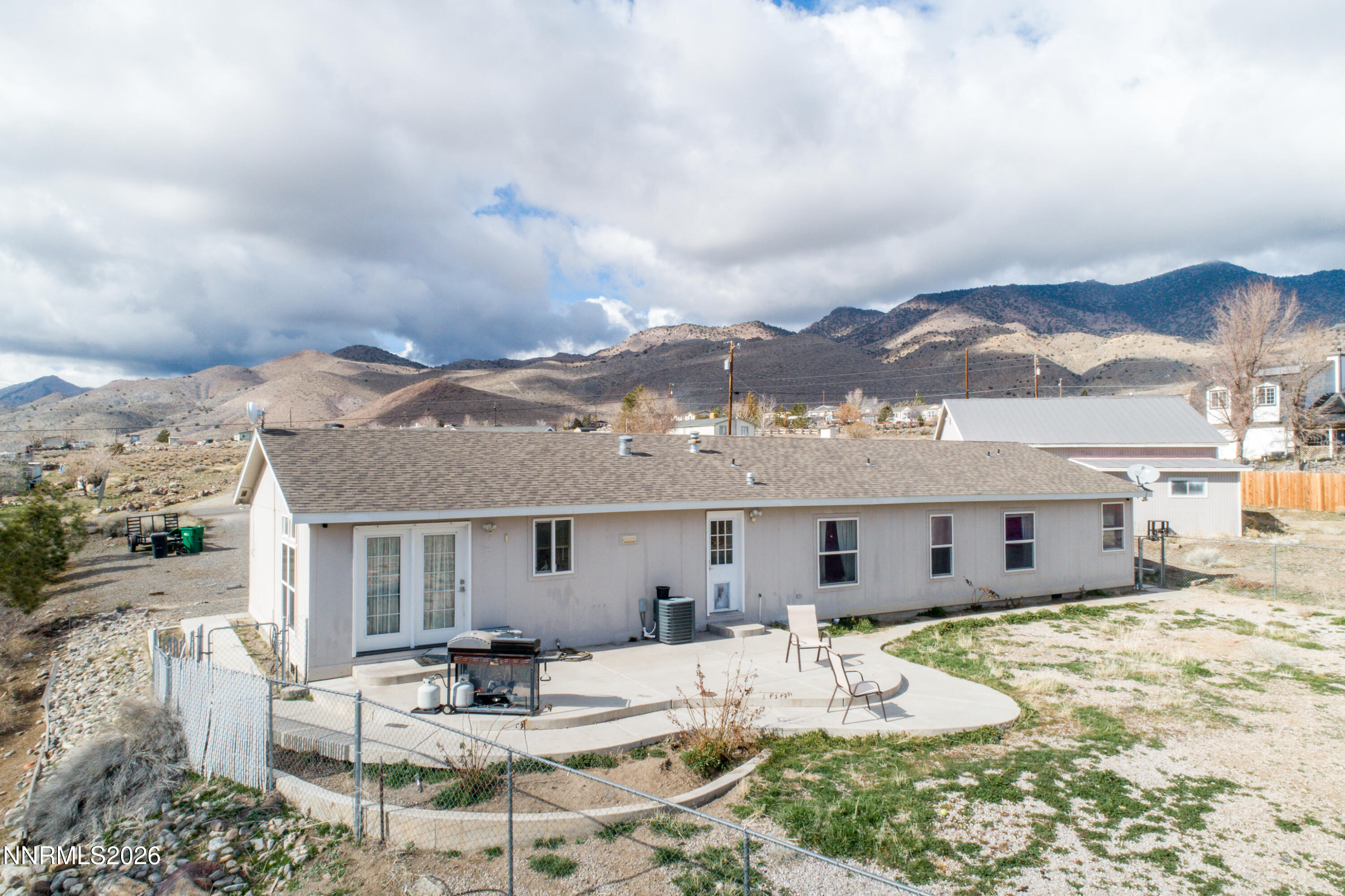 222 Julie Way Dayton, NV 89403 - Photo 22 of 28 a view of a house with backyard