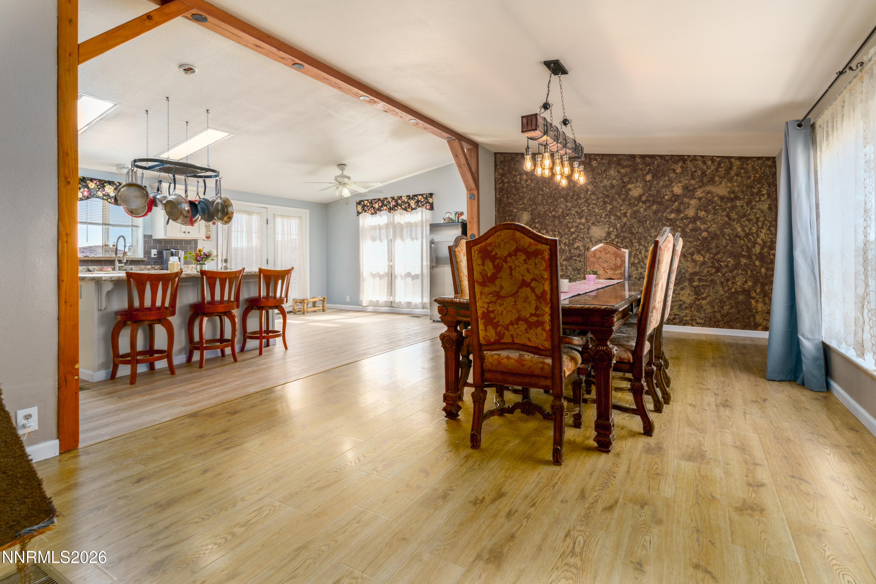 222 Julie Way Dayton, NV 89403 - Photo 4 of 28 a view of a dining room with furniture and wooden floor