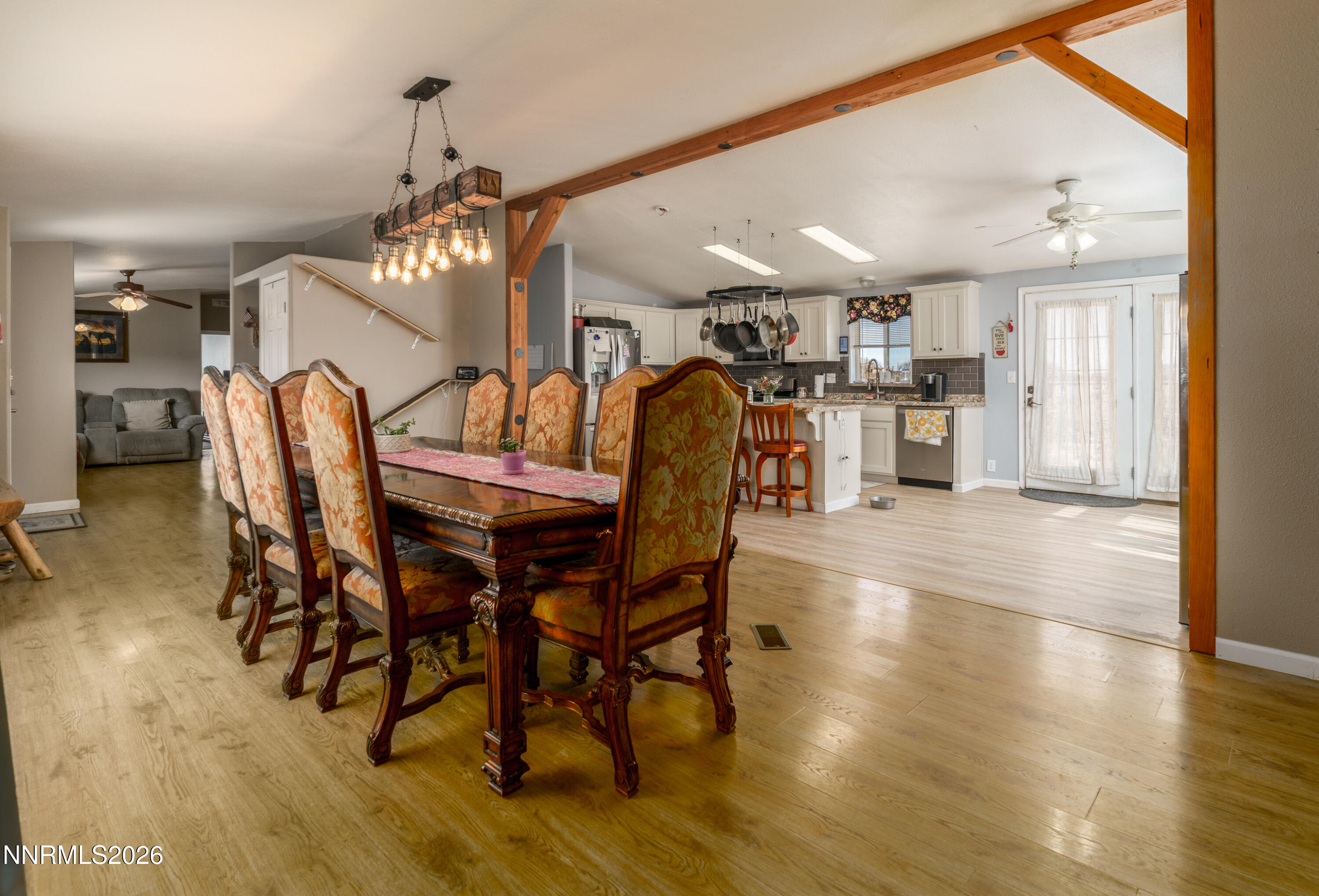 222 Julie Way Dayton, NV 89403 - Photo 5 of 28 a dining room with furniture and wooden floor