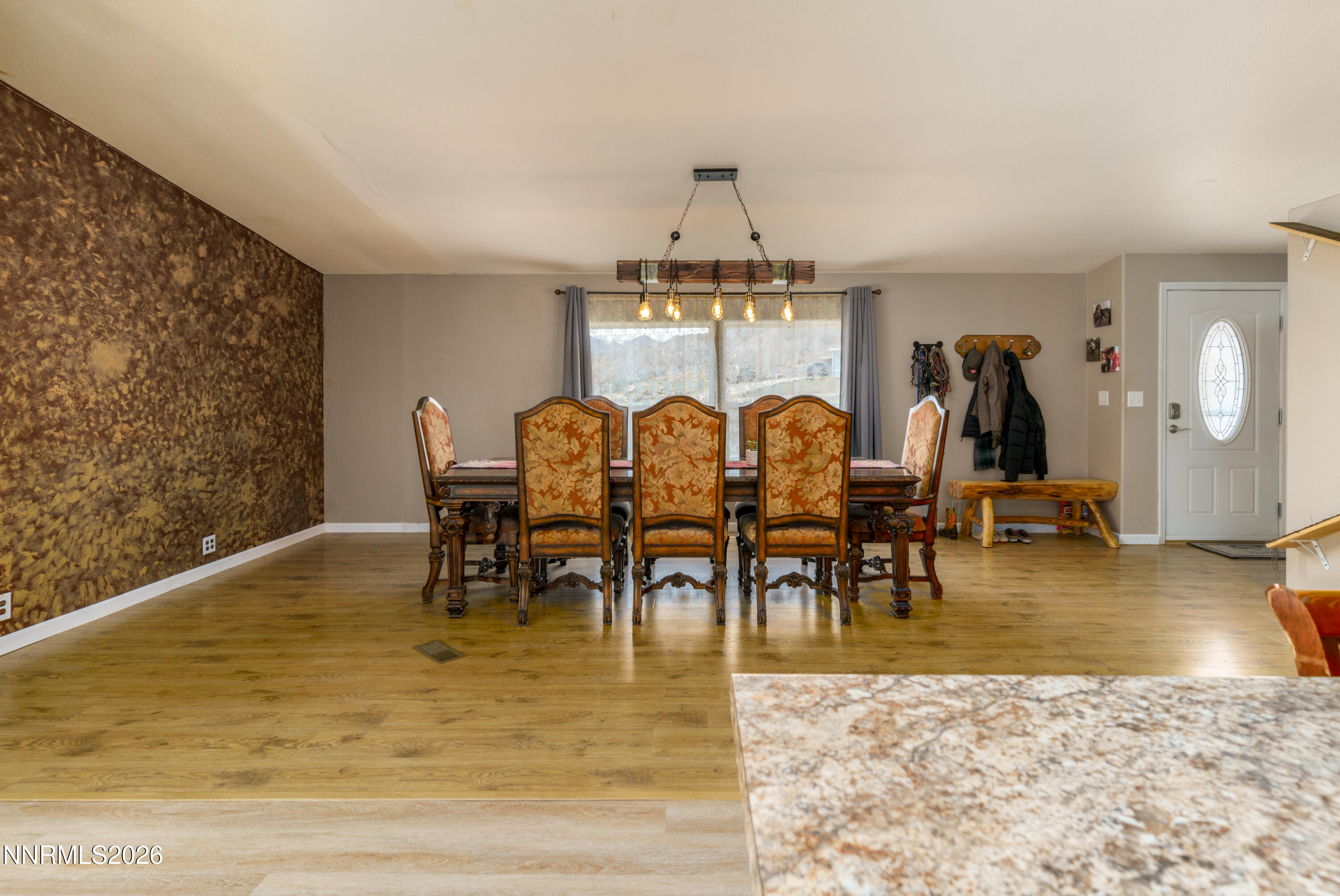 222 Julie Way Dayton, NV 89403 - Photo 6 of 28 a view of a dining room with furniture and chandelier