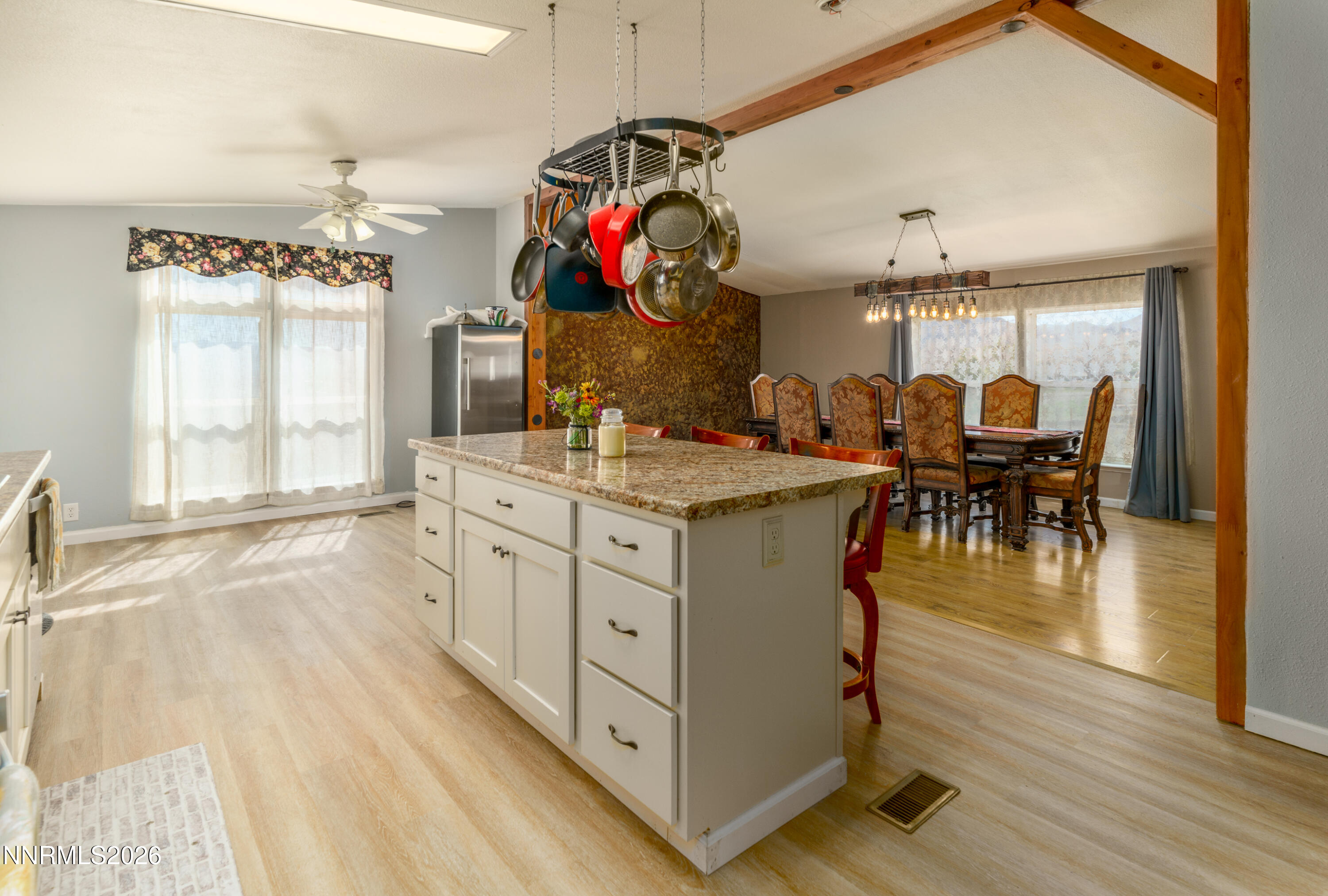 222 Julie Way Dayton, NV 89403 - Photo 10 of 28 a dinning area with chandelier fan and wooden floor