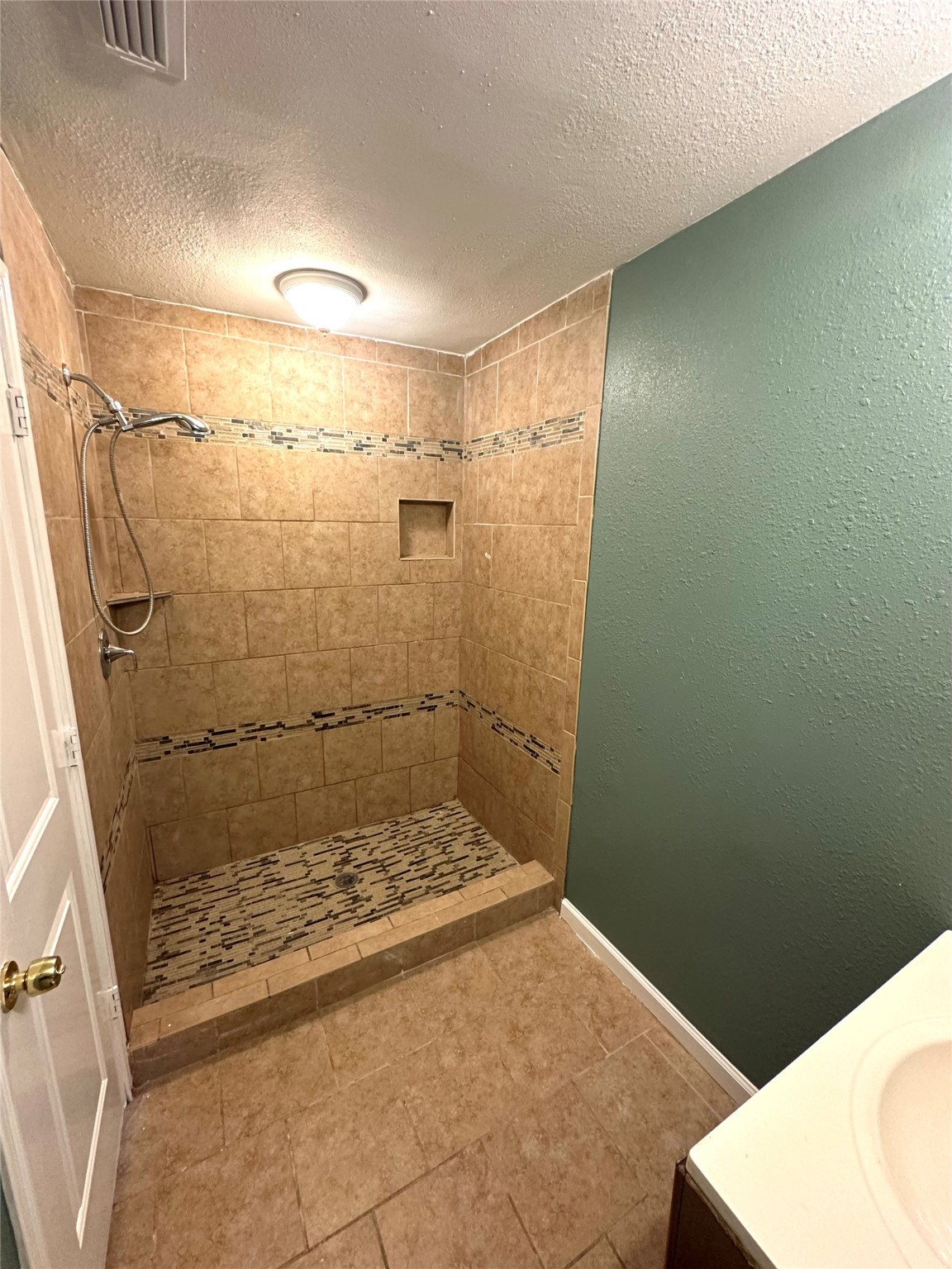 8611 Findlay Street Houston, TX 77017 - Photo 8 of 18 a bathroom with a shower