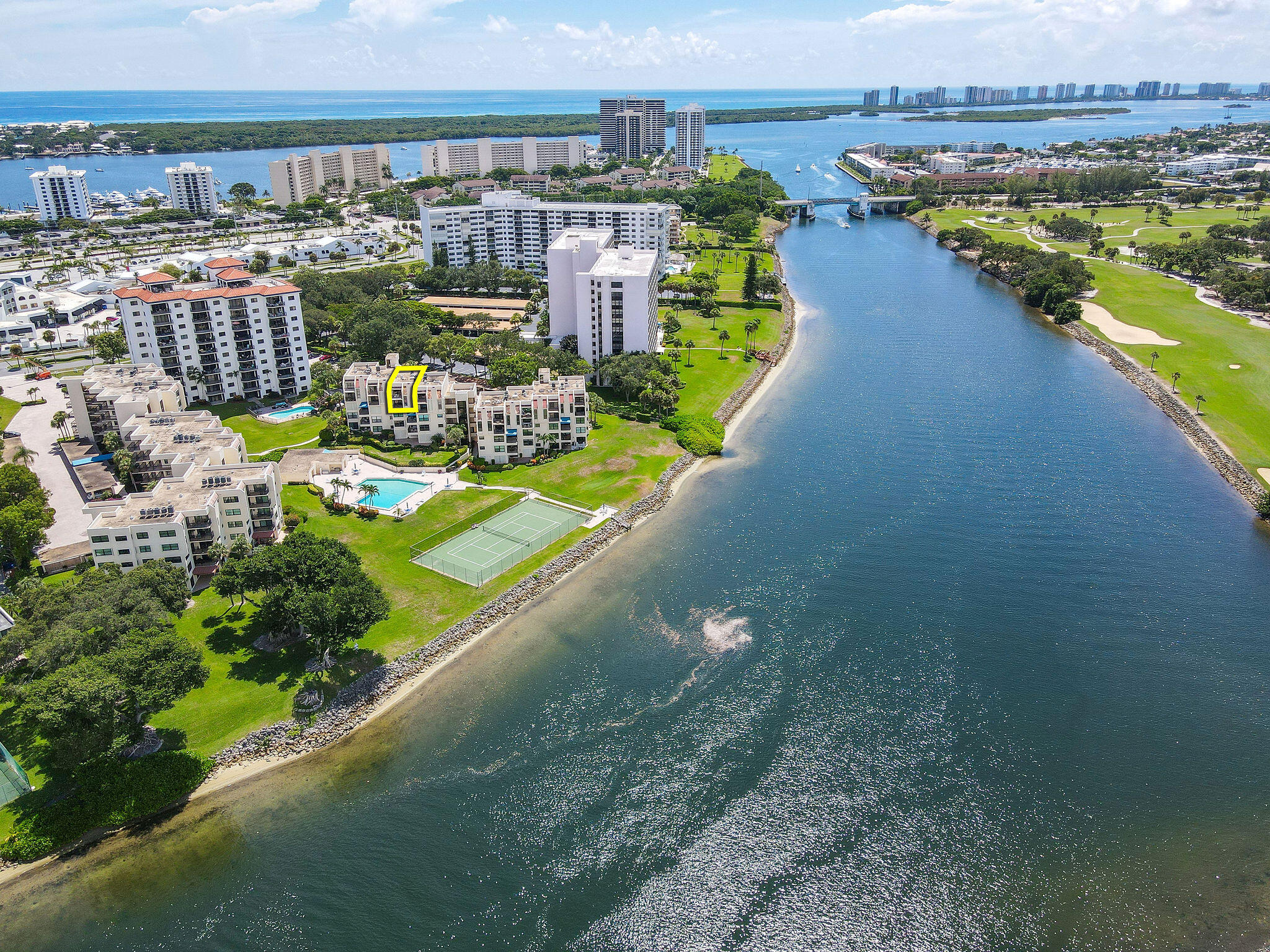 364 Golfview Road, Unit 506 North Palm Beach, FL 33408 - Photo 1 of 44 a view of a city with an ocean view