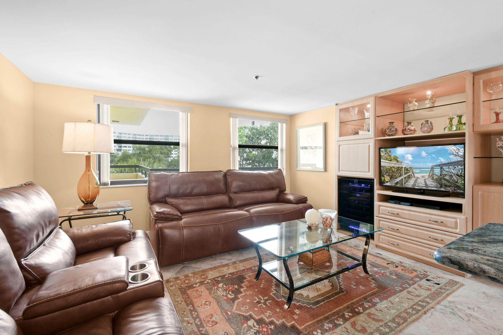 364 Golfview Road, Unit 506 North Palm Beach, FL 33408 - Photo 19 of 44 a living room with furniture and a flat screen tv