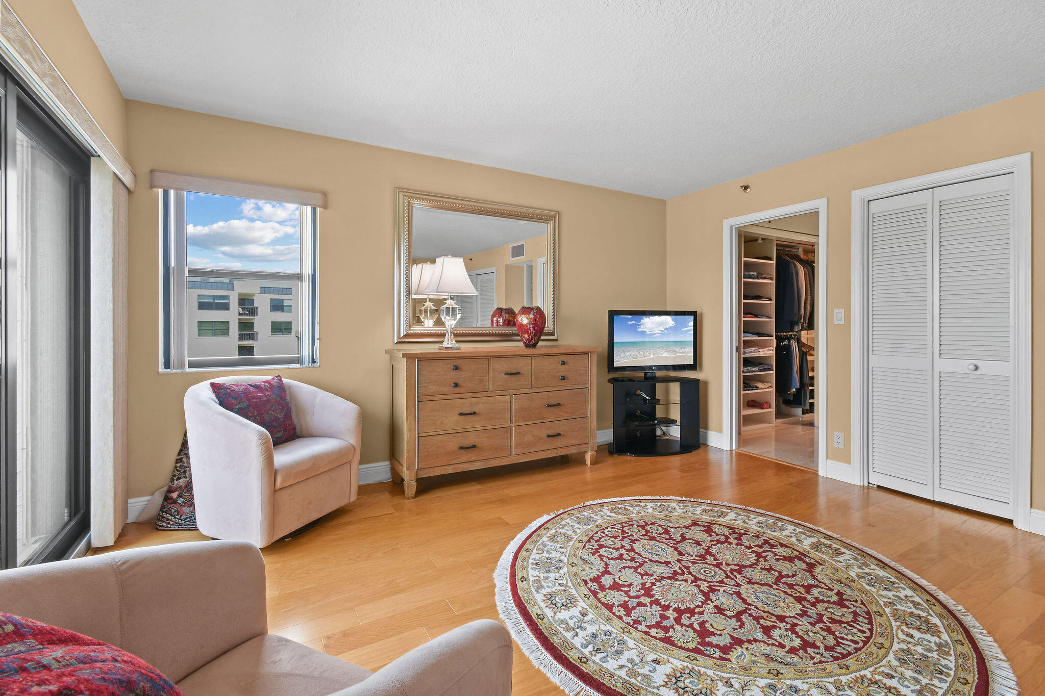 364 Golfview Road, Unit 506 North Palm Beach, FL 33408 - Photo 25 of 44 a living room with furniture and a fireplace