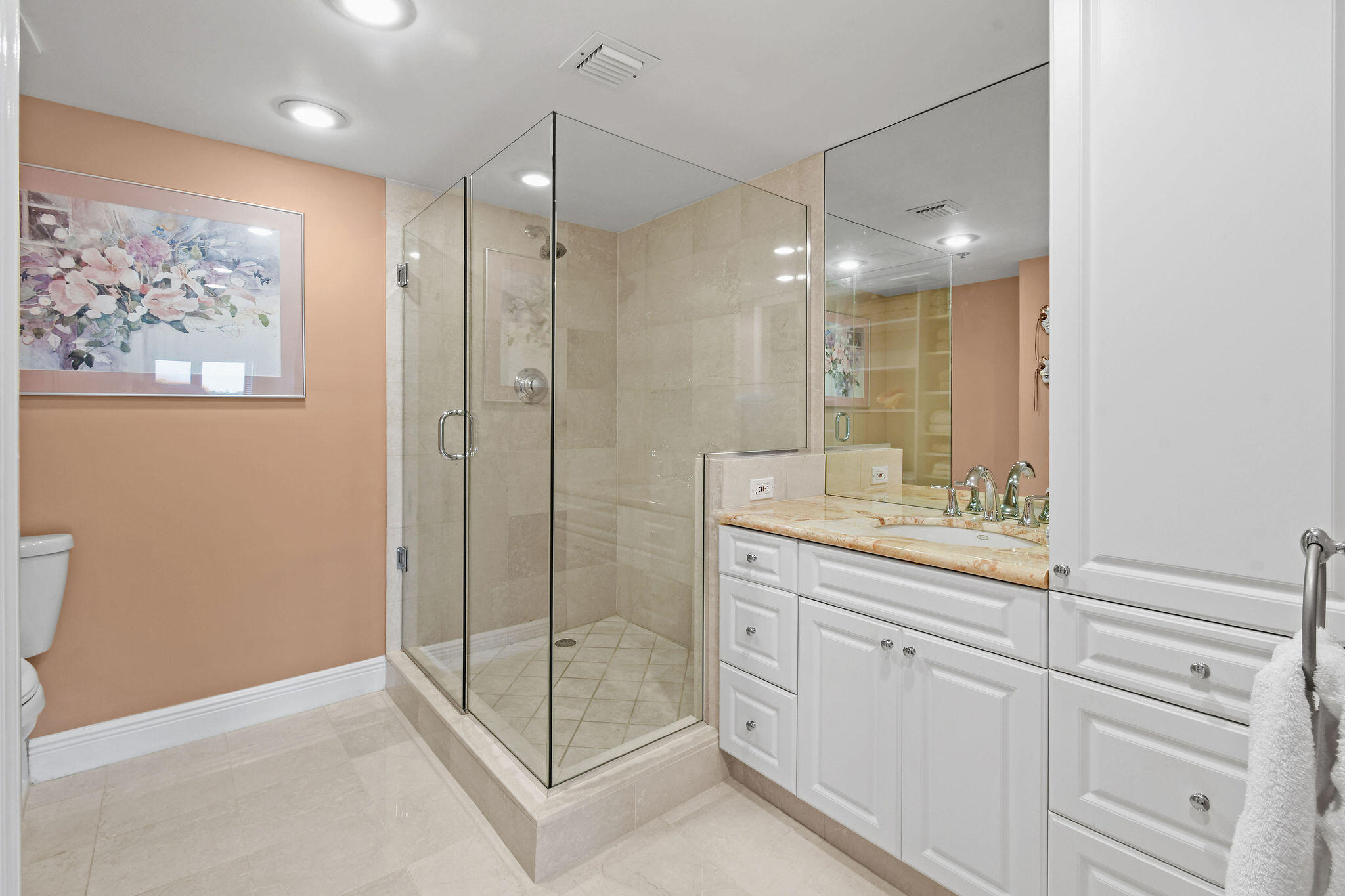 364 Golfview Road, Unit 506 North Palm Beach, FL 33408 - Photo 31 of 44 a bathroom with a shower sink and mirror