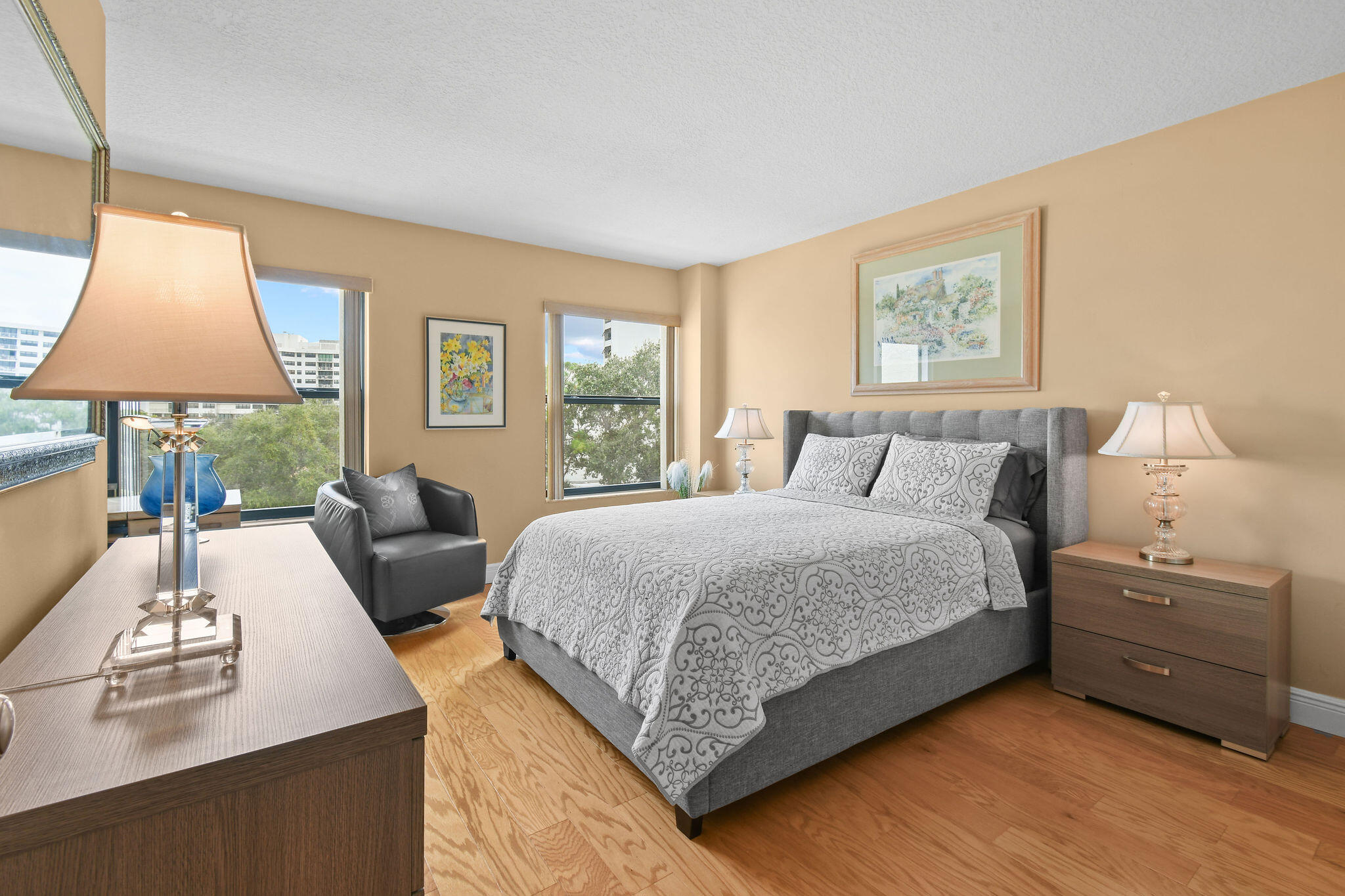 364 Golfview Road, Unit 506 North Palm Beach, FL 33408 - Photo 33 of 44 a bedroom with a bed and a night stand