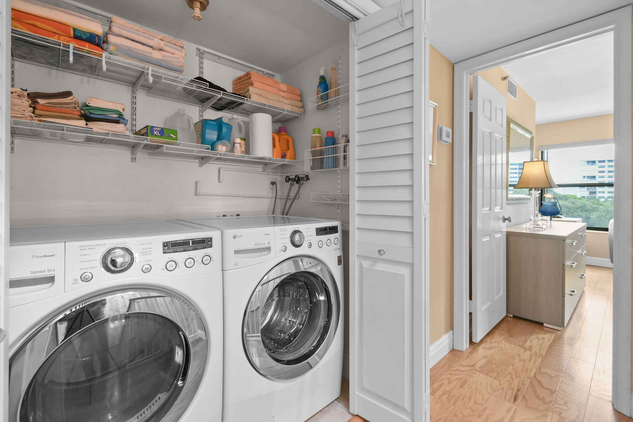 364 Golfview Road, Unit 506 North Palm Beach, FL 33408 - Photo 40 of 44 a view of storage and utility room with washer and dryer
