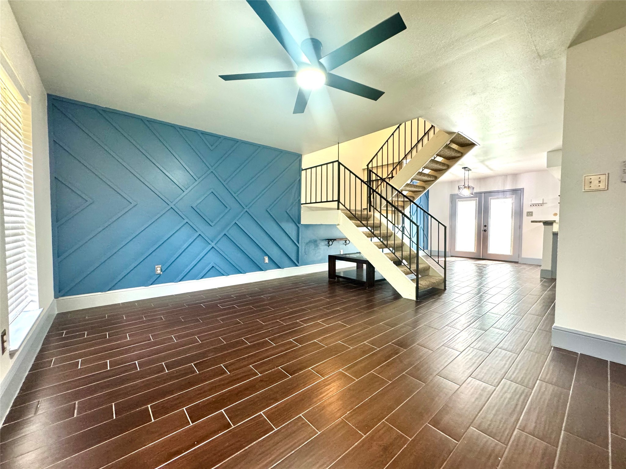 10010 Knoboak Drive, Unit 32 Houston, TX 77080 - Photo 3 of 17 a view of entryway and hall with wooden floor