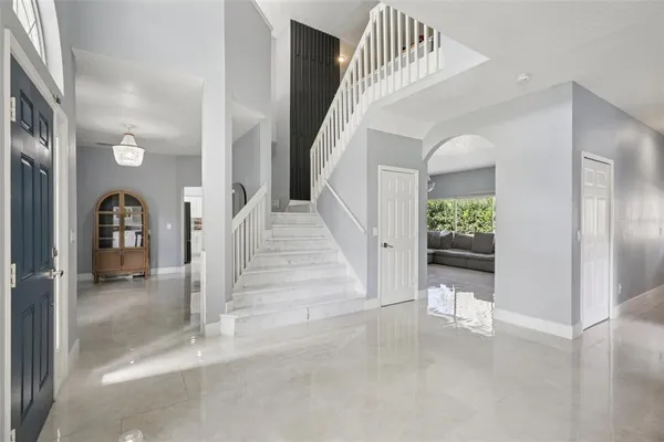 a bedroom with a bed and a view of bedroom