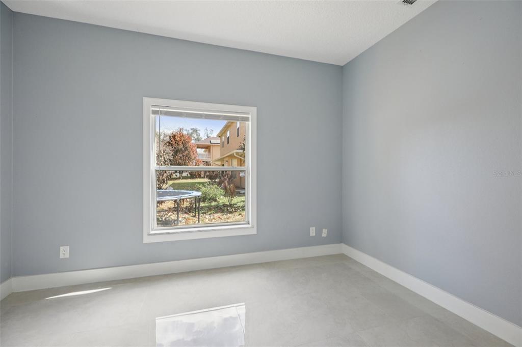 1978 Applegate Drive Ocoee, FL 34761 - Photo 9 of 50 an empty room with a window