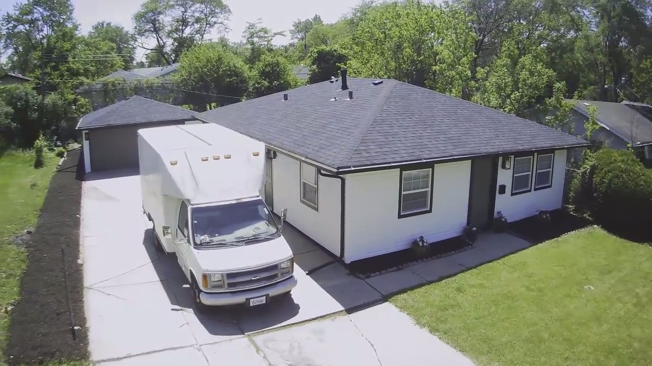 570 Andover Street Chicago Heights, IL 60411 - Photo 3 of 22 a aerial view of a house with a yard