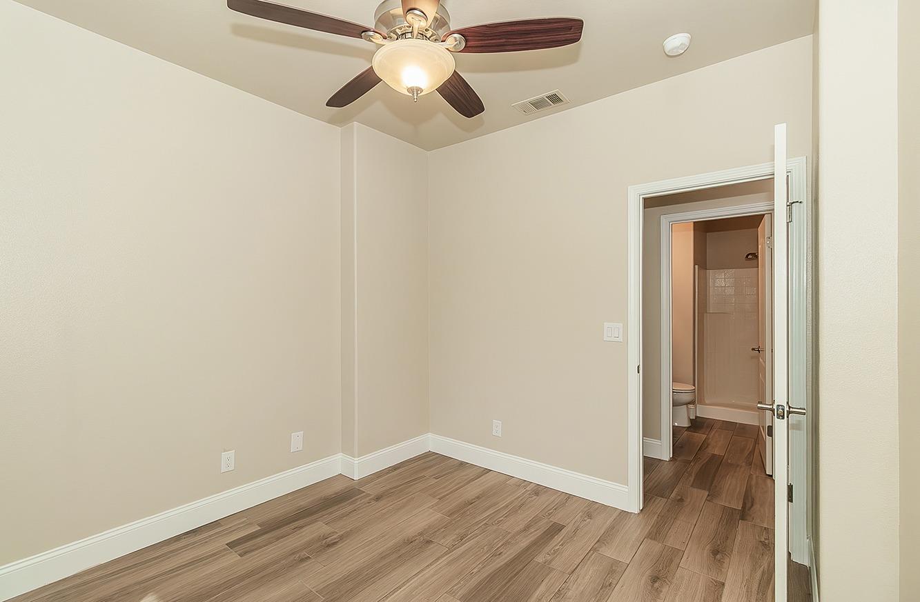 735 West Brittany Lane Clovis, CA 93619 - Photo 18 of 30 wooden floor in an empty room