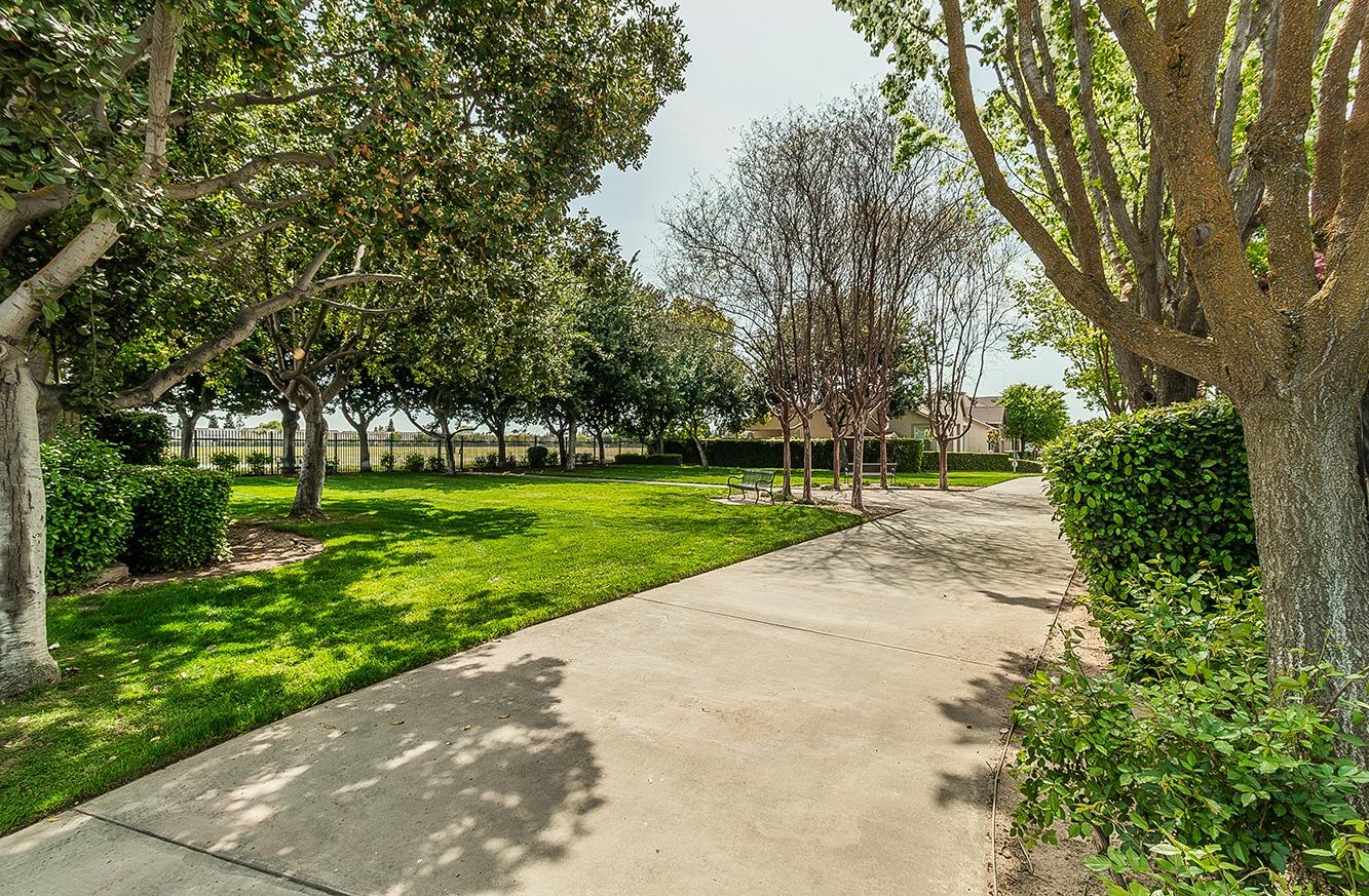735 West Brittany Lane Clovis, CA 93619 - Photo 27 of 30 a view of a park with tree s