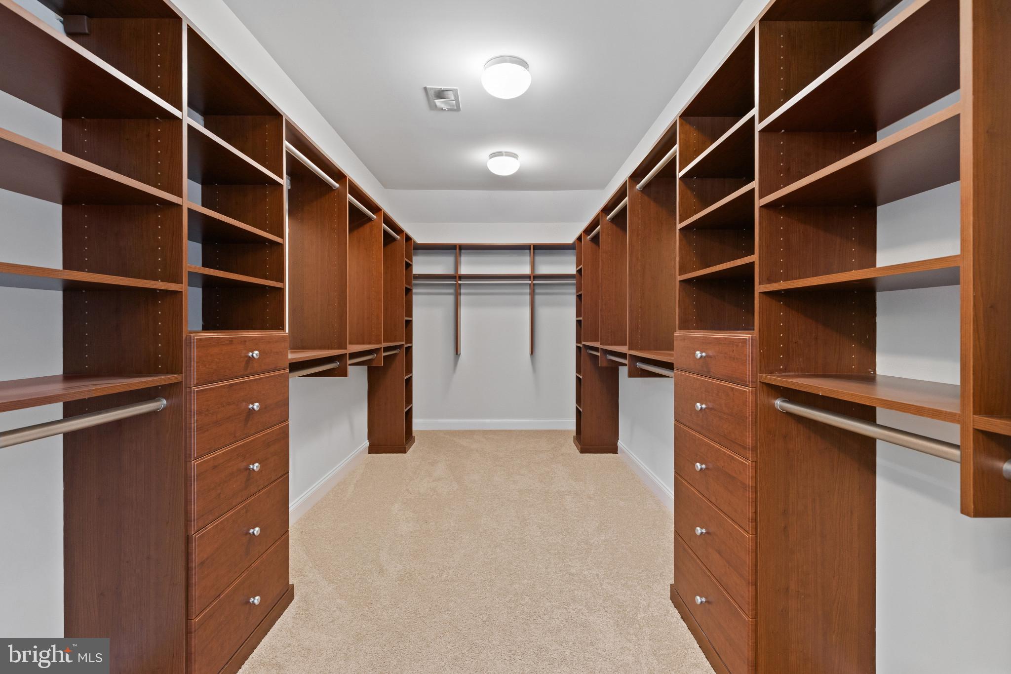 10725 Taylor Farm Road Woodstock, MD 21163 - Photo 33 of 70 a view of walk in closet with empty racks