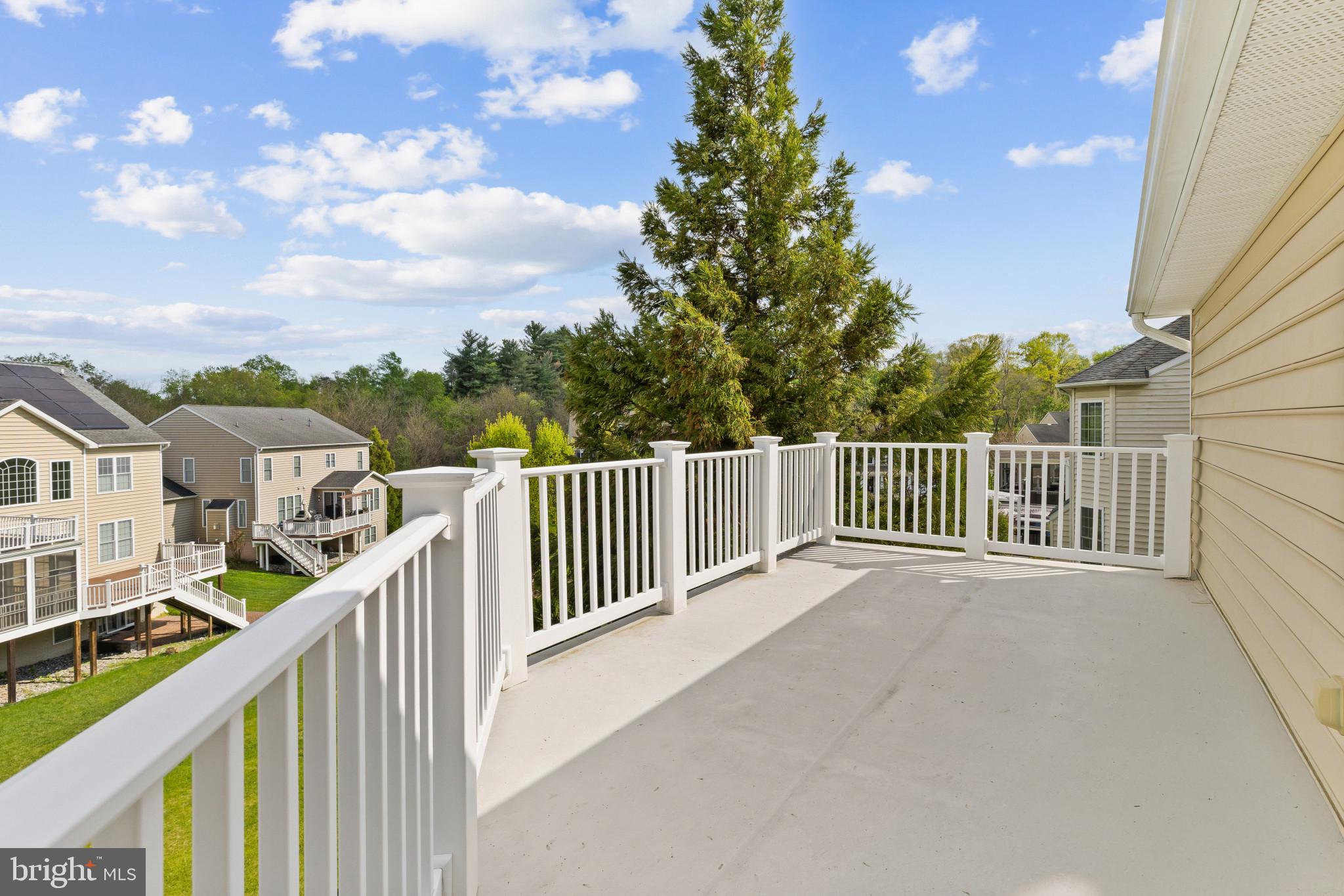 10725 Taylor Farm Road Woodstock, MD 21163 - Photo 34 of 70 a view of a houses from a balcony