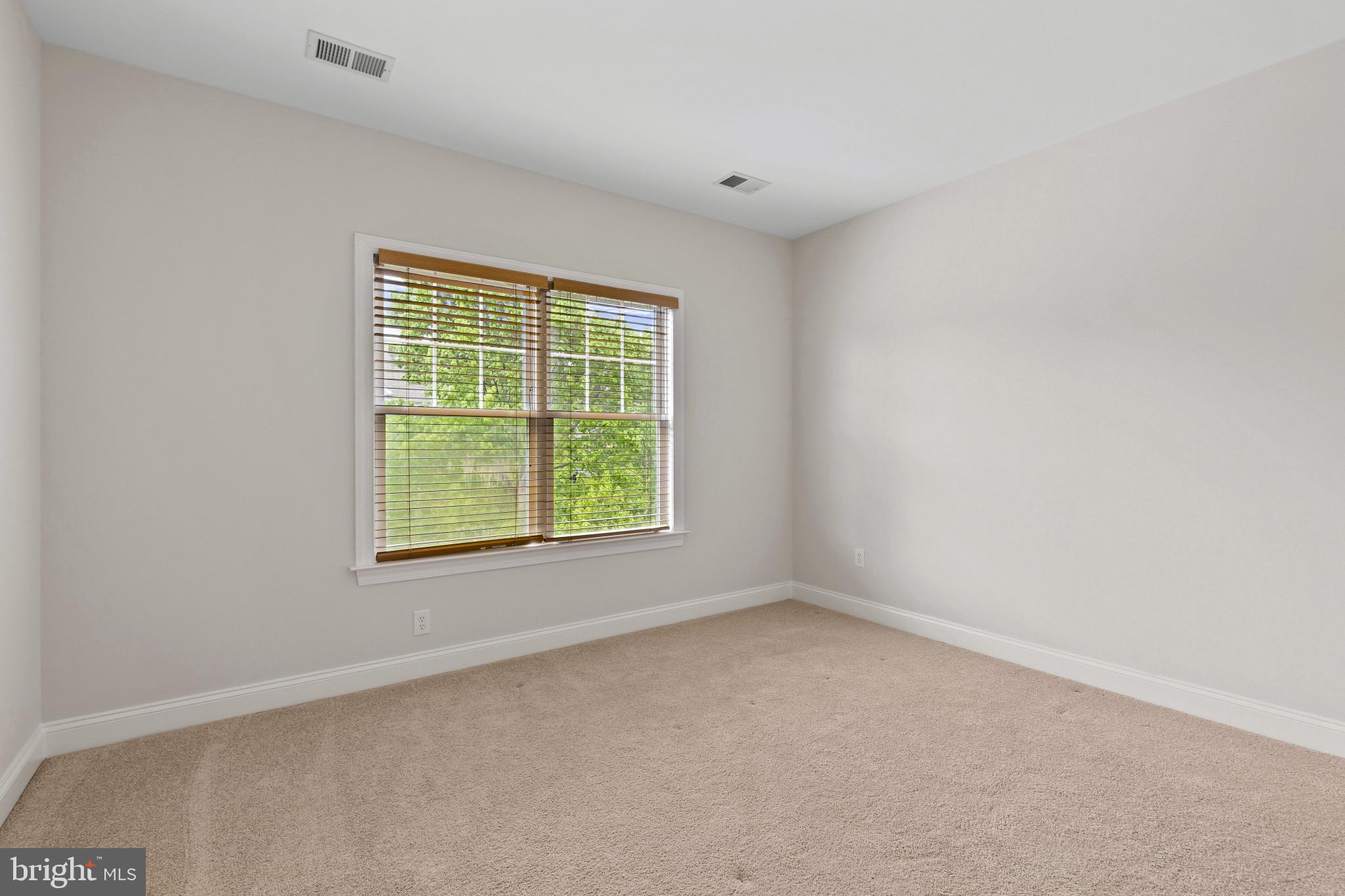 10725 Taylor Farm Road Woodstock, MD 21163 - Photo 38 of 70 an empty room with a window