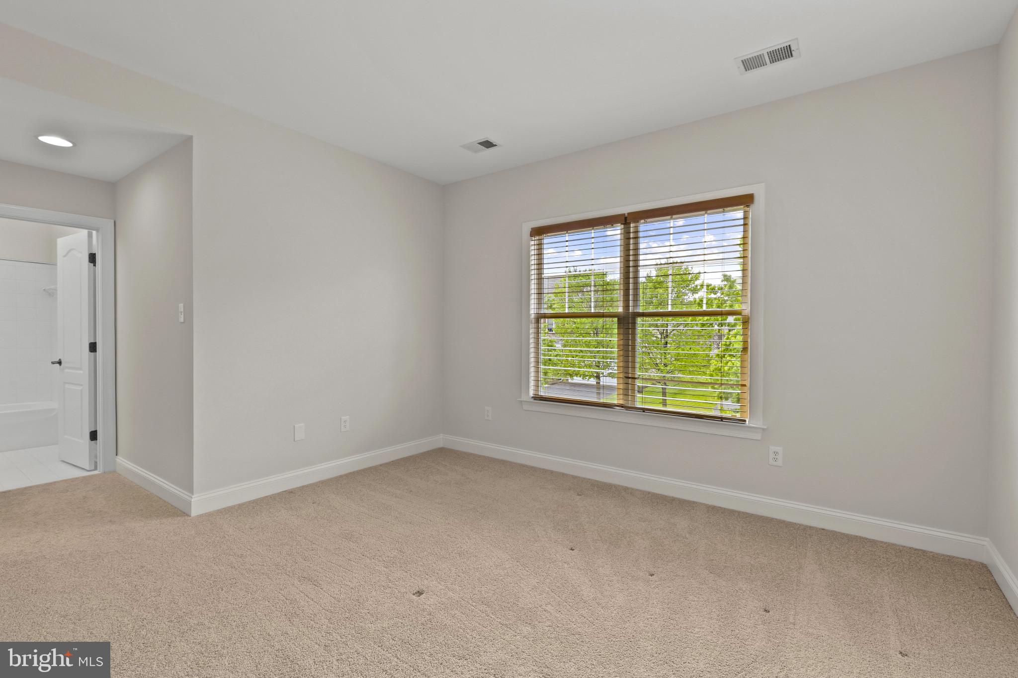 10725 Taylor Farm Road Woodstock, MD 21163 - Photo 41 of 70 a view of an empty room with a window