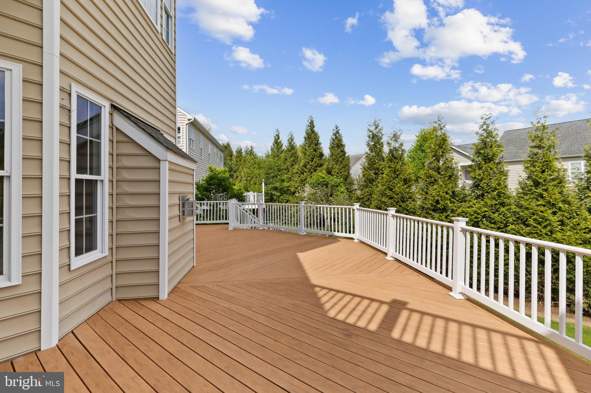 10725 Taylor Farm Road Woodstock, MD 21163 - Photo 58 of 70 a view of a balcony with wooden floor and fence