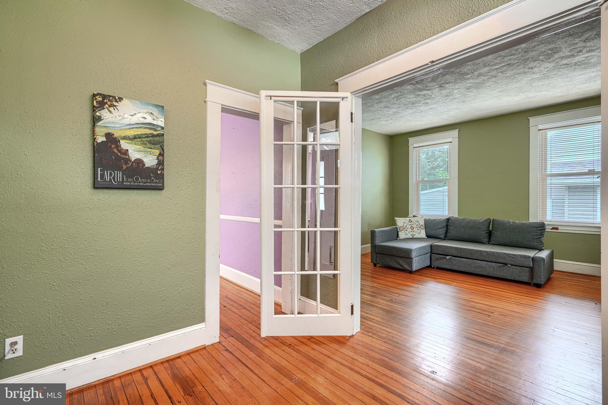 2705 Latona Road Baltimore, MD 21214 - Photo 4 of 53 a living room with furniture and wooden floor