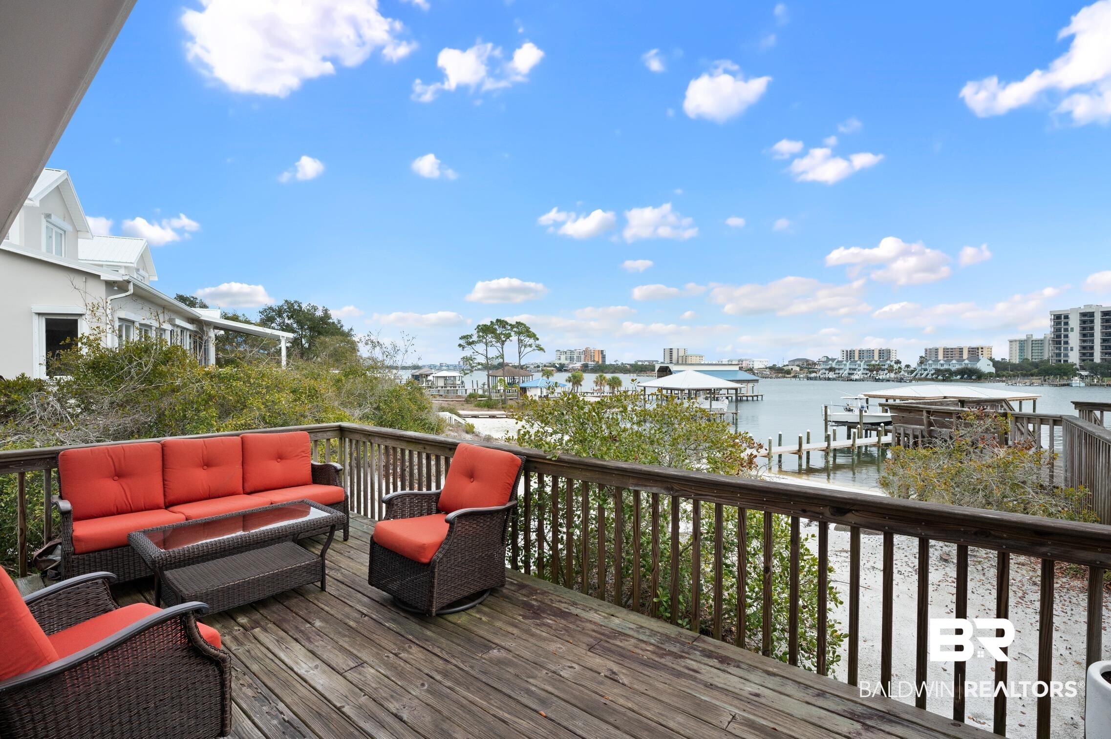 30388 River Road Orange Beach, AL 36561 - Photo 38 of 72 Wooden deck with a view of city, outdoor lounge area, and a water view