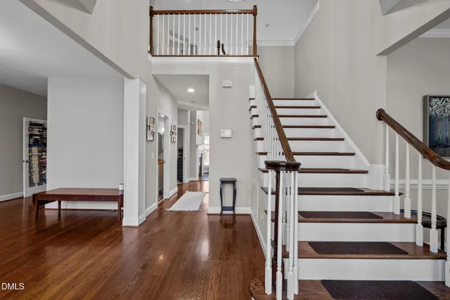 a view of an entryway with wooden floor