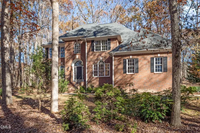 a view of swimming pool with a patio