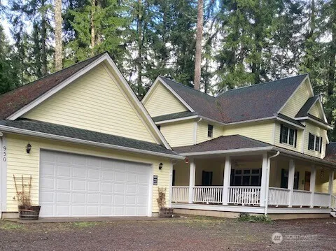 a front view of a house with garage