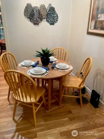 a bedroom with a bed and a lamp