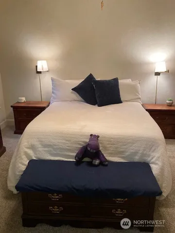 a bathroom with a shower and a sink