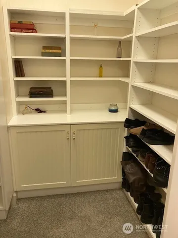 a living room with furniture and window