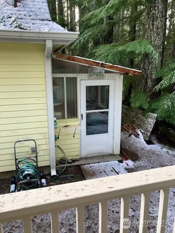 a big yard with lots of green space and trees