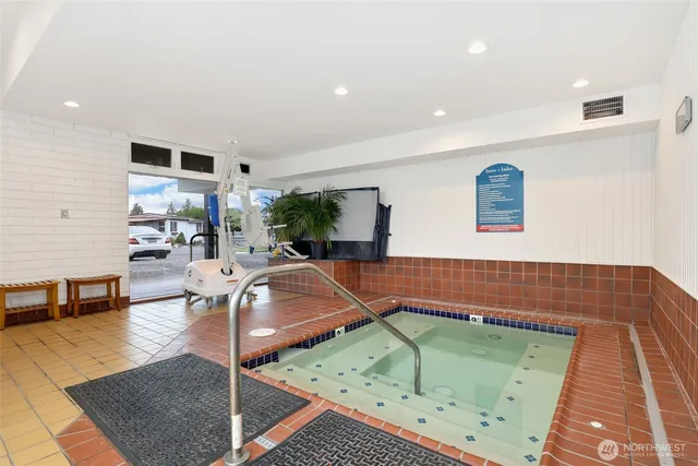 a view of a living room and dining room