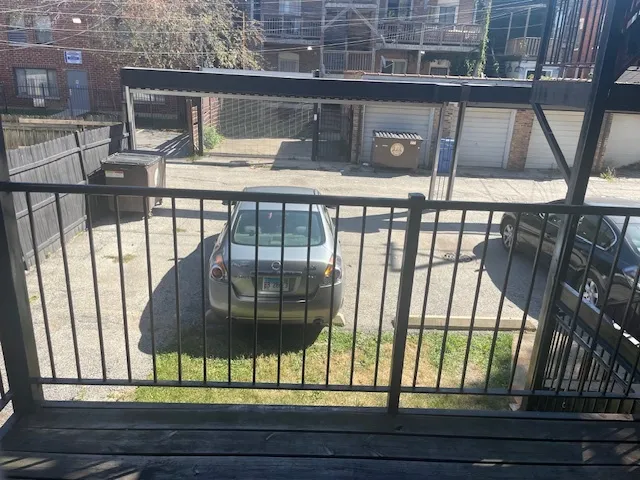 a bathroom with a granite countertop sink and mirror