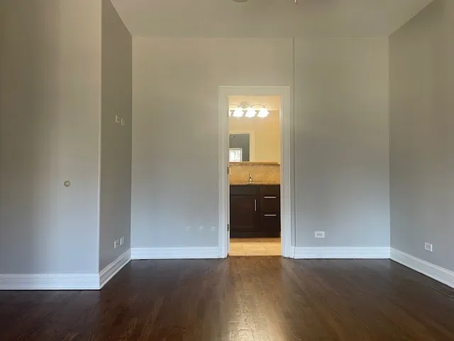 a bathroom with a shower and a toilet